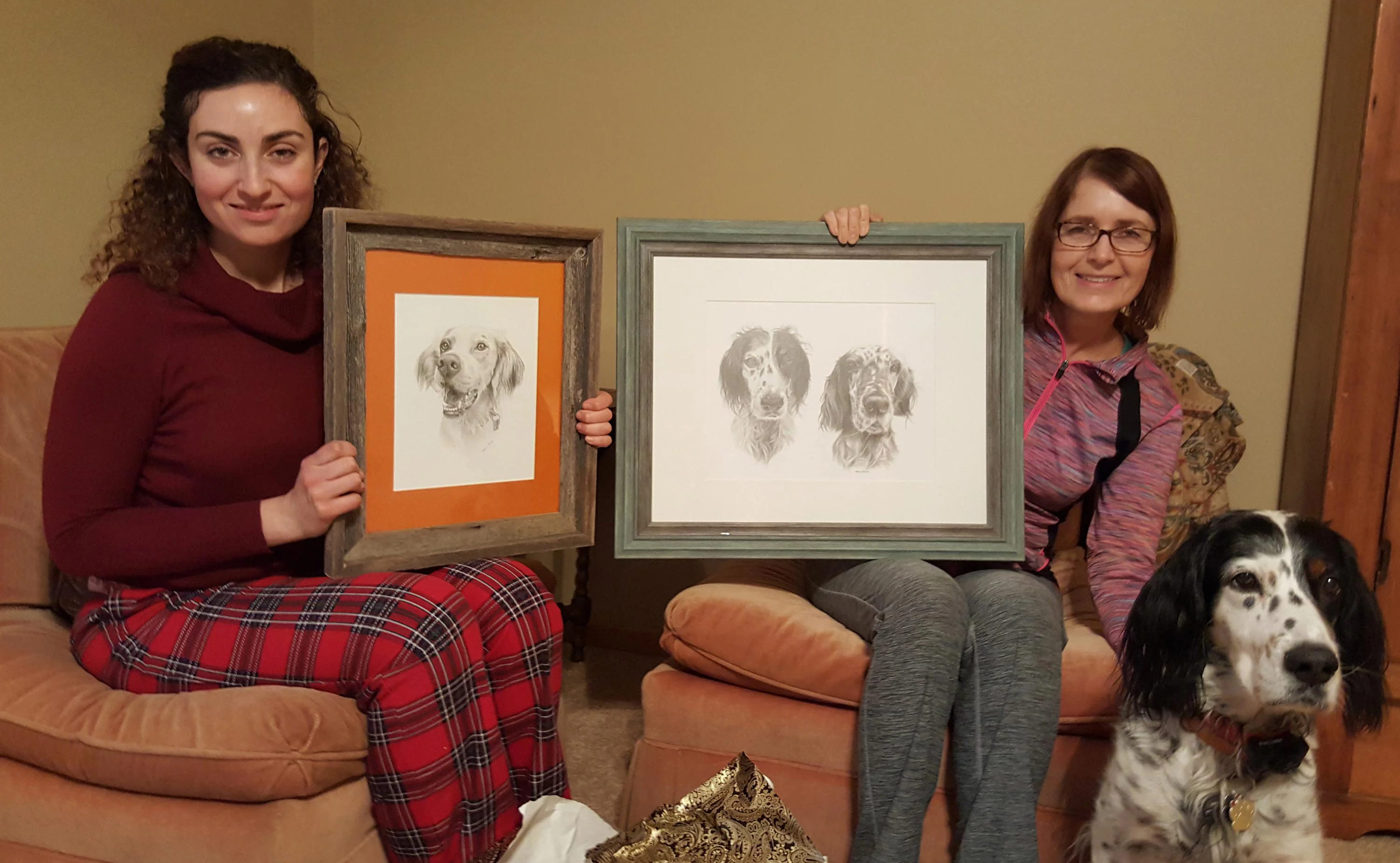 Close-up of a classic pencil drawing of dogs by Melanie Phillips, highlighting intricate detail.