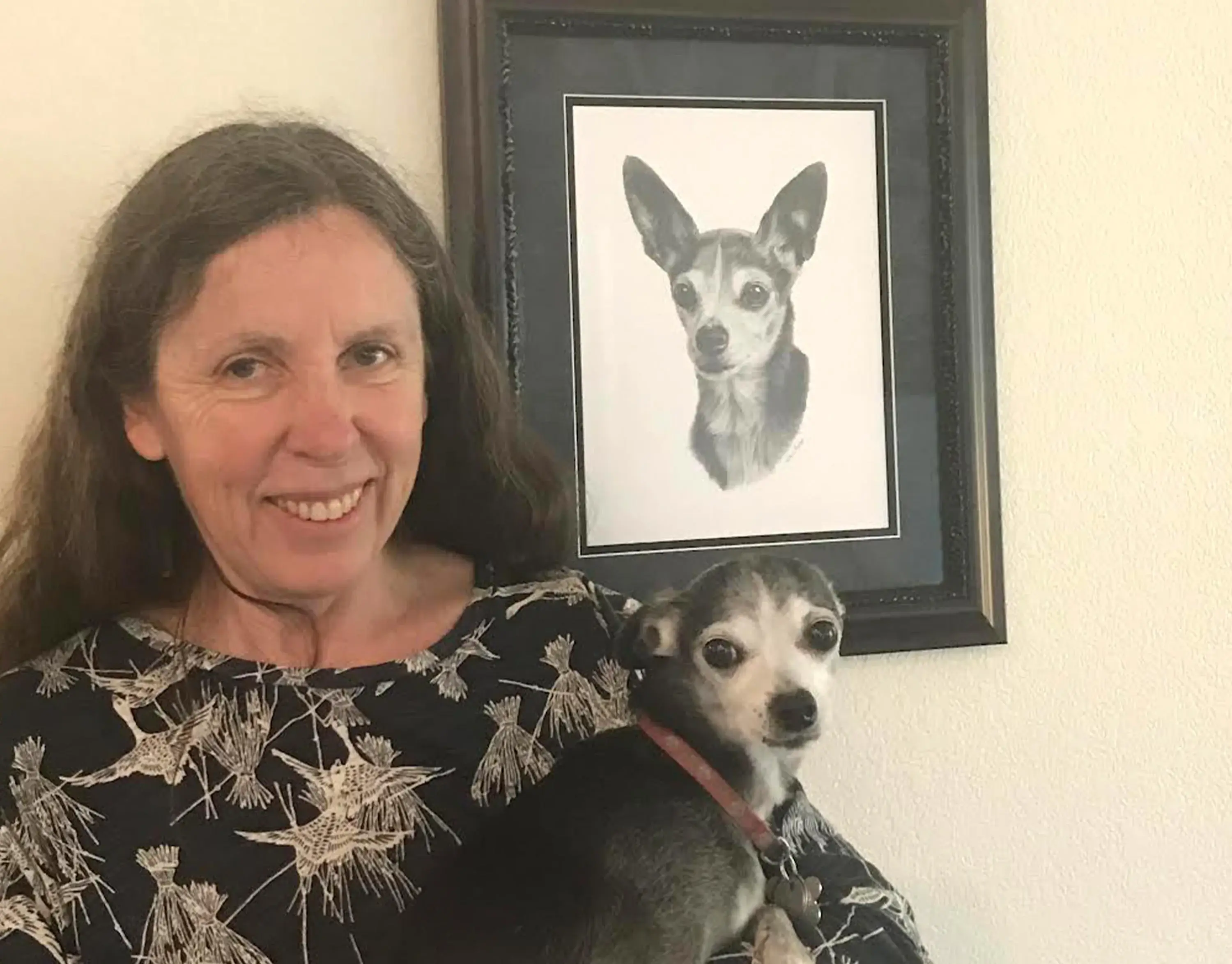 Close-up of a classic pencil drawing of dogs by Melanie Phillips, highlighting intricate detail.