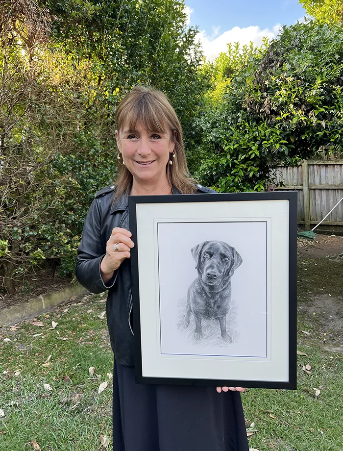 The pet portrait of Emrik being held by its owner Jaqueline Pentelow from Australia