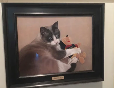 A stunning, almost 3D oil portrait of Frankie, which has amazed clients Gary and Barb for its color and realistic skill.