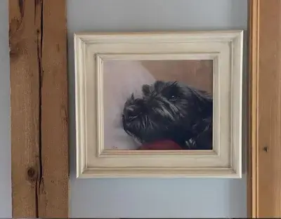 Lottie's portrait displayed beautifully in a newly redecorated room, highlighting its fantastic appearance.